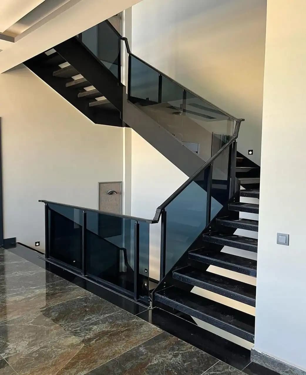 General view of an industrial steel stair leading to a platform